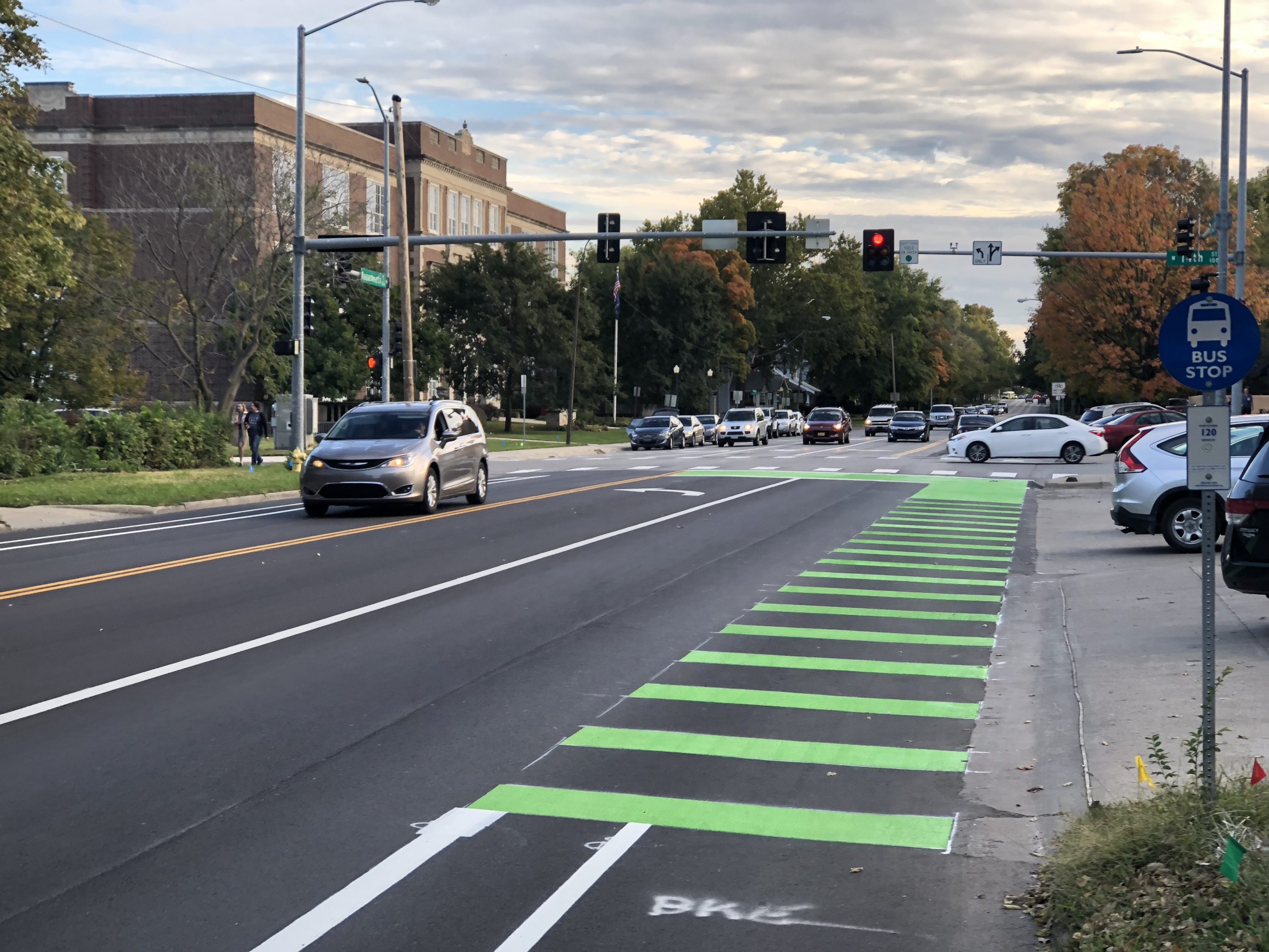 City installs new type of bike lane on portion of Massachusetts Street